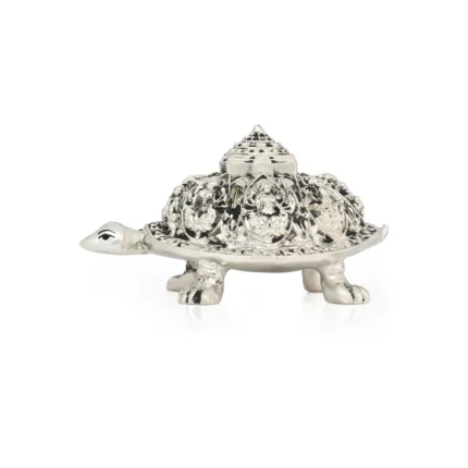 Bring prosperity, positivity, and elegance to your home with the 999 Silver Plated Ashtalakshmi Tortoise by Koolpool Art. Beautifully crafted with a premium silver-plated finish, this auspicious tortoise features the divine Ashtalakshmi design, symbolizing wealth, success, health, and good fortune. Ideal for home décor, pooja rooms, offices, and gifting on festivals, housewarmings, and special occasions. Brand: Koolpool Art Material: 999 Silver Plated Ideal For: Home, Office, Pooja, Vastu & Gift Purpose Finish: Premium Silver Plated Package Includes: 1 × Ashtalakshmi Tortoise Showpiece